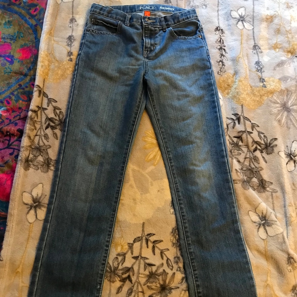Place boys skinny jeans.
